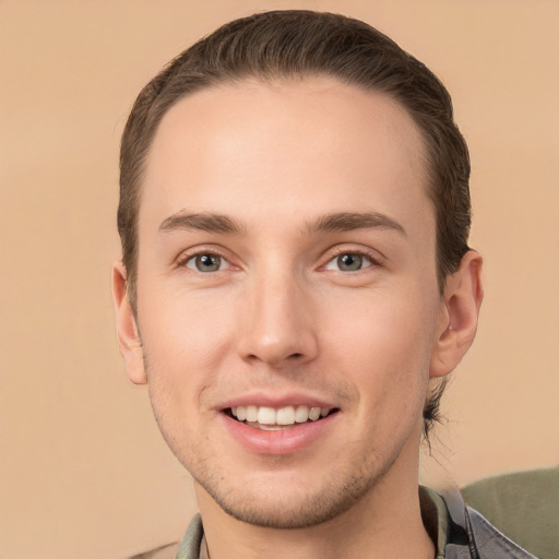 Joyful white young-adult male with short  brown hair and brown eyes