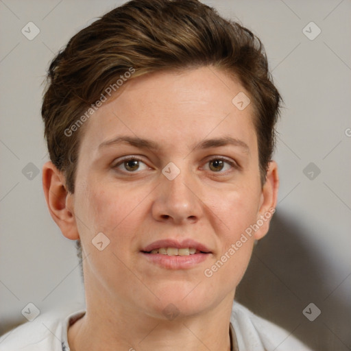 Joyful white adult female with short  brown hair and brown eyes