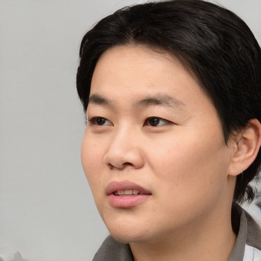 Neutral asian young-adult male with short  black hair and brown eyes