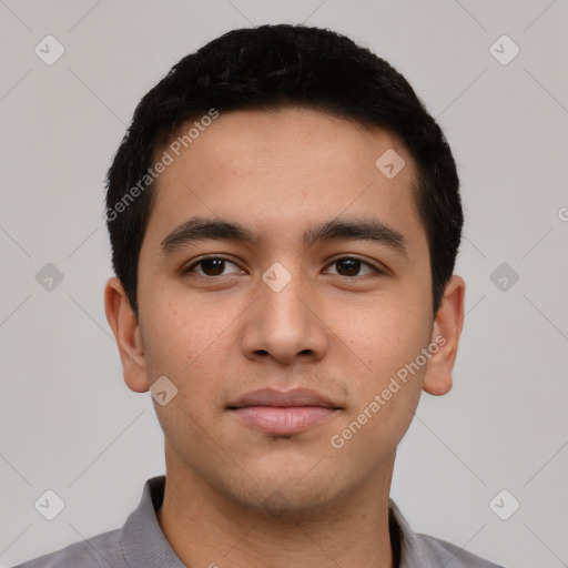 Neutral latino young-adult male with short  black hair and brown eyes