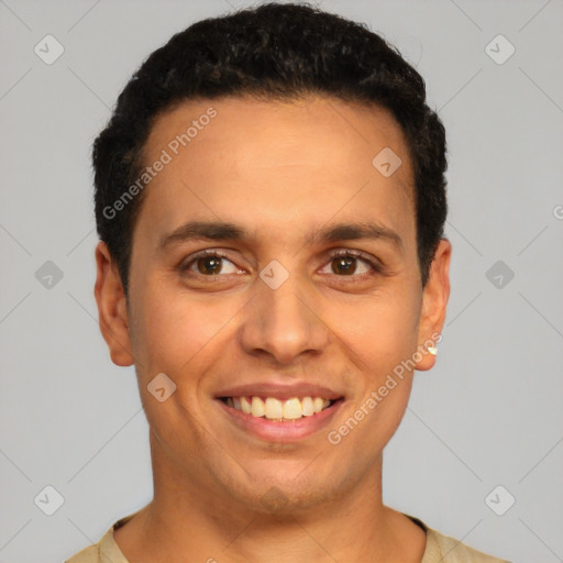 Joyful latino young-adult male with short  brown hair and brown eyes