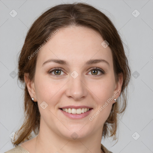 Joyful white young-adult female with medium  brown hair and green eyes