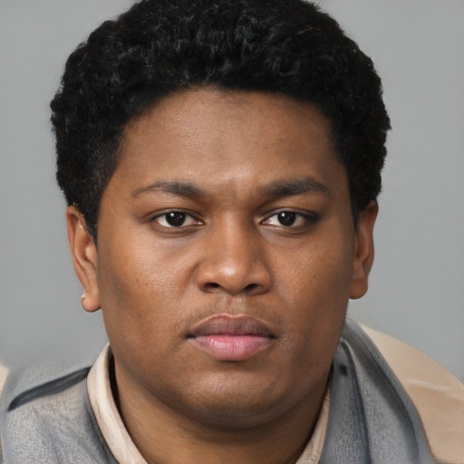 Neutral black young-adult male with short  brown hair and brown eyes
