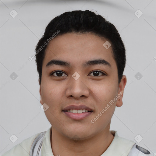 Joyful latino young-adult male with short  black hair and brown eyes