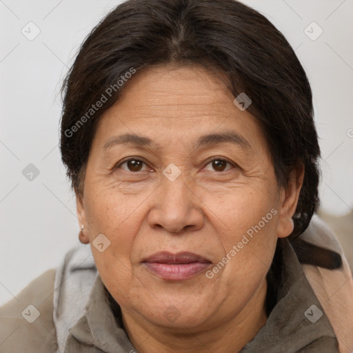 Joyful white middle-aged female with short  brown hair and brown eyes