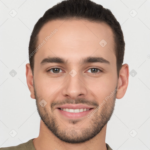 Joyful white young-adult male with short  brown hair and brown eyes