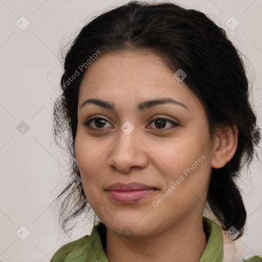 Joyful latino young-adult female with medium  brown hair and brown eyes