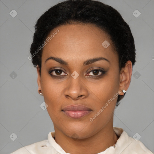 Joyful black young-adult female with short  black hair and brown eyes