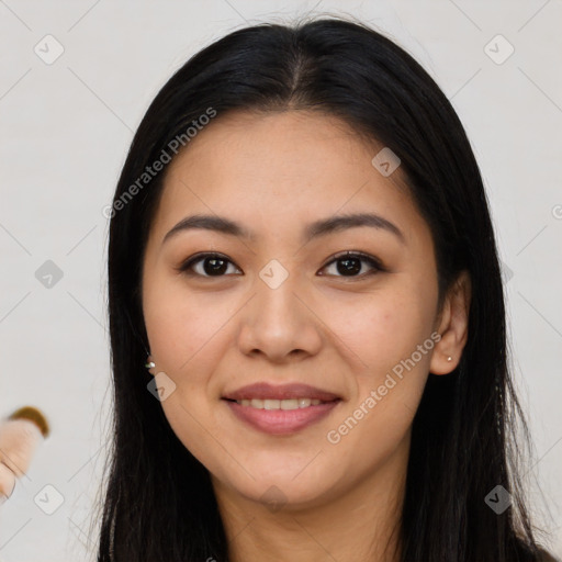 Joyful white young-adult female with long  brown hair and brown eyes