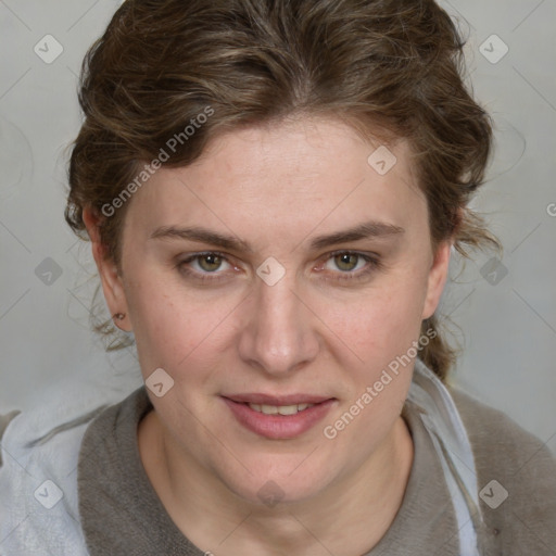 Joyful white adult female with medium  brown hair and blue eyes