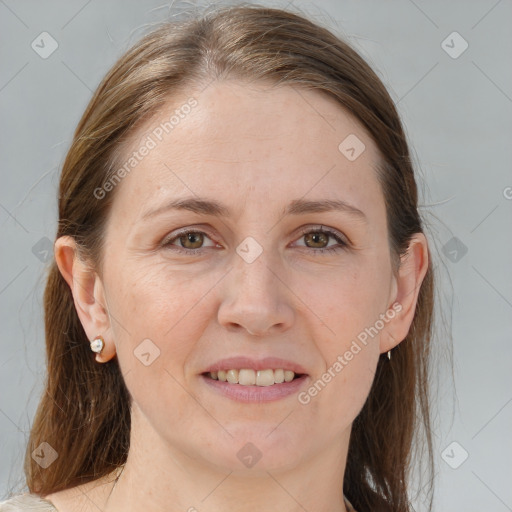 Joyful white adult female with medium  brown hair and grey eyes