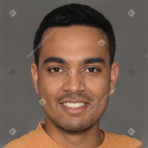 Joyful latino young-adult male with short  black hair and brown eyes