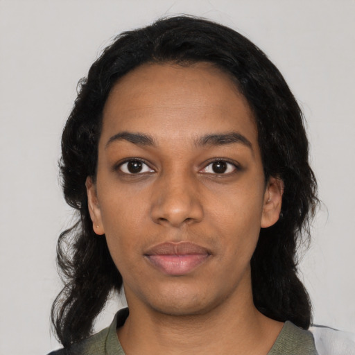 Neutral black young-adult female with medium  black hair and brown eyes