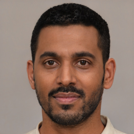 Neutral black young-adult male with short  black hair and brown eyes