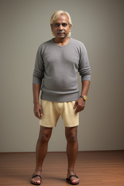 Sri lankan 45 years male with  blonde hair