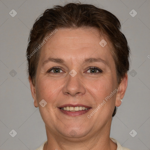 Joyful white adult female with short  brown hair and brown eyes