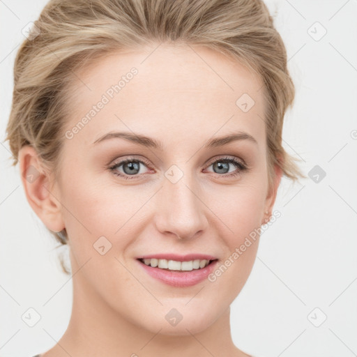 Joyful white young-adult female with medium  brown hair and blue eyes