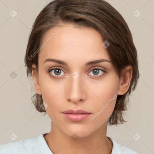 Neutral white young-adult female with medium  brown hair and brown eyes