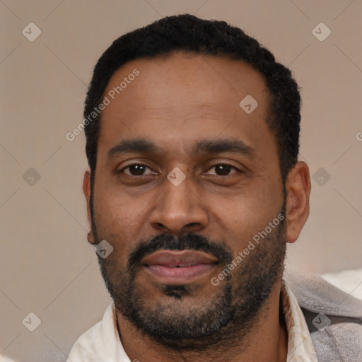 Neutral latino adult male with short  black hair and brown eyes
