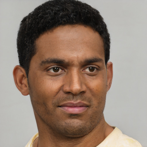 Neutral black young-adult male with short  brown hair and brown eyes