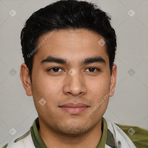 Joyful latino young-adult male with short  brown hair and brown eyes