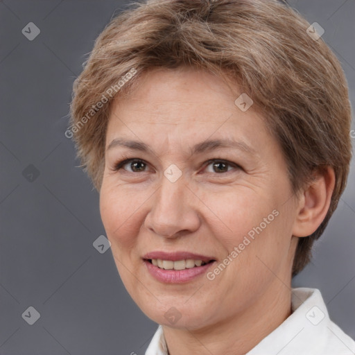 Joyful white adult female with short  brown hair and brown eyes