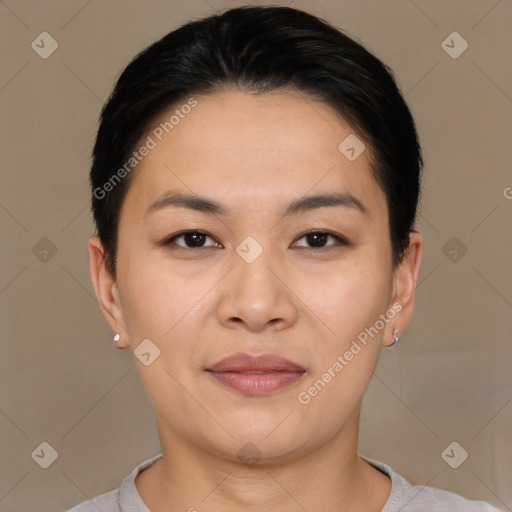 Joyful asian young-adult female with short  brown hair and brown eyes