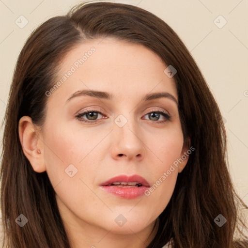 Neutral white young-adult female with long  brown hair and brown eyes