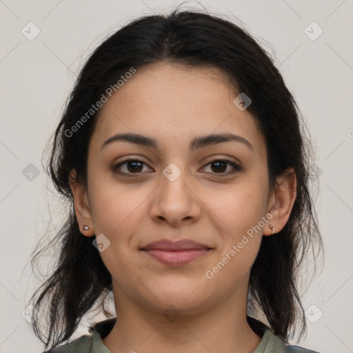 Joyful latino young-adult female with medium  brown hair and brown eyes