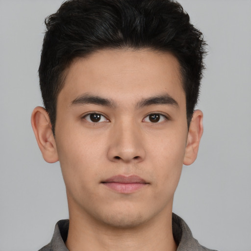 Neutral asian young-adult male with short  brown hair and brown eyes