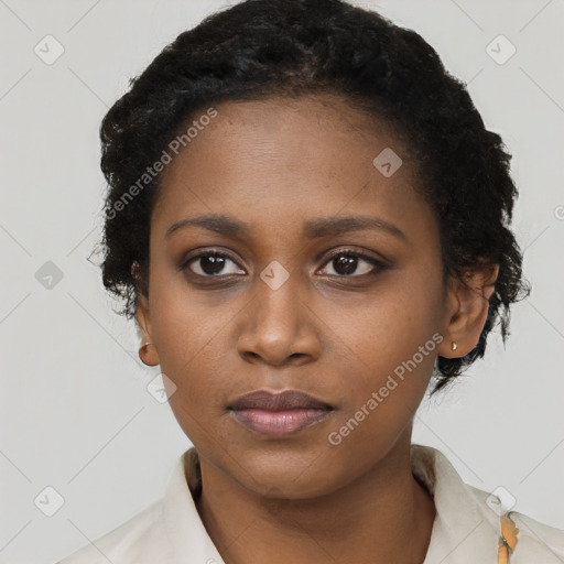 Neutral black young-adult female with short  black hair and brown eyes