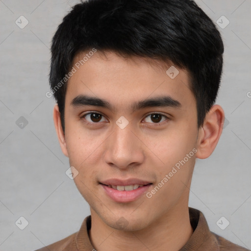 Joyful asian young-adult male with short  brown hair and brown eyes