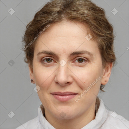 Joyful white adult female with short  brown hair and brown eyes