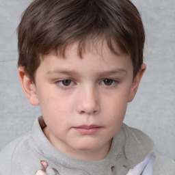 Neutral white child male with short  brown hair and grey eyes