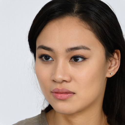 Neutral asian young-adult female with long  black hair and brown eyes