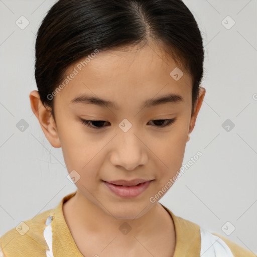 Joyful white child female with short  brown hair and brown eyes