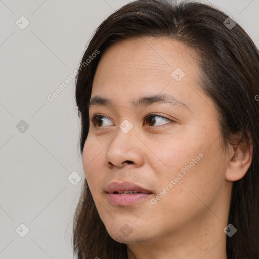 Neutral white young-adult female with long  brown hair and brown eyes