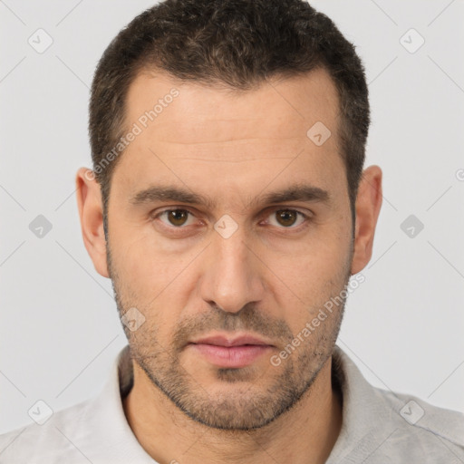 Neutral white adult male with short  brown hair and brown eyes