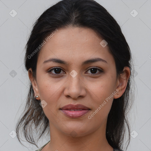 Joyful latino young-adult female with medium  brown hair and brown eyes