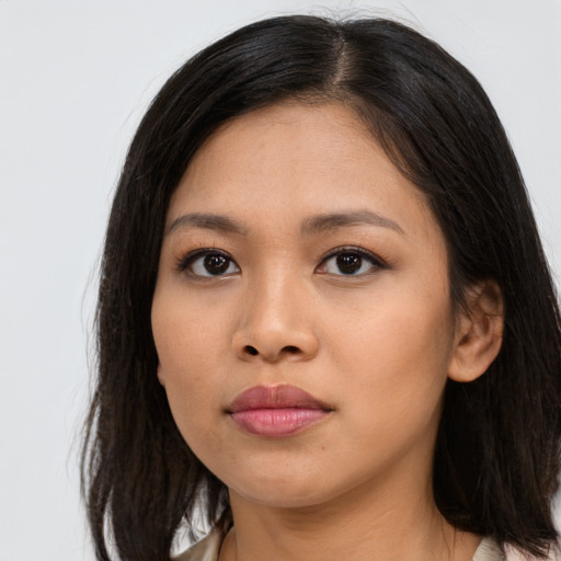 Neutral asian young-adult female with medium  black hair and brown eyes