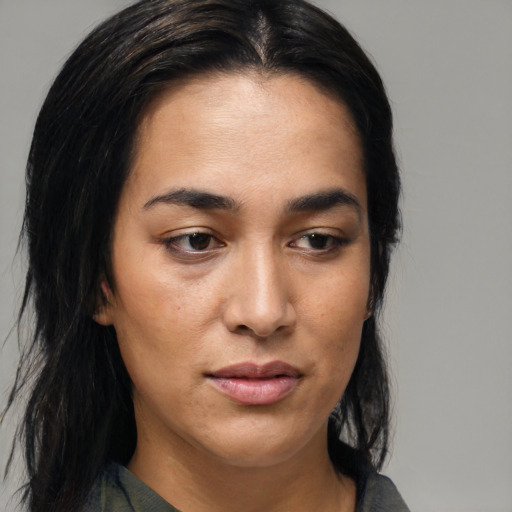 Joyful latino young-adult female with medium  black hair and brown eyes