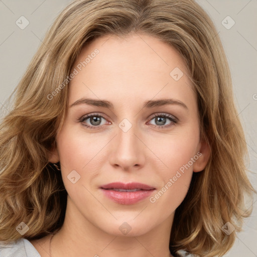 Joyful white young-adult female with medium  brown hair and green eyes