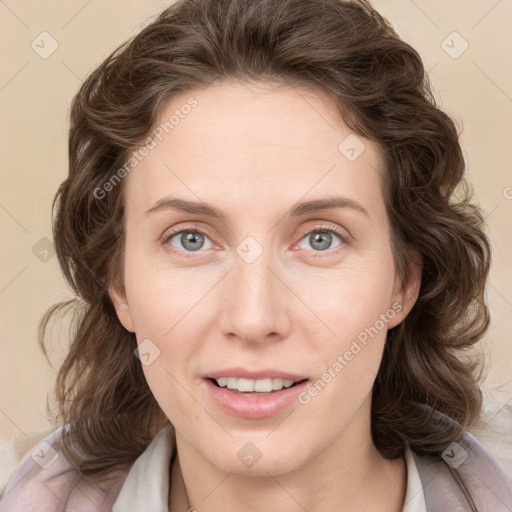 Joyful white young-adult female with medium  brown hair and blue eyes