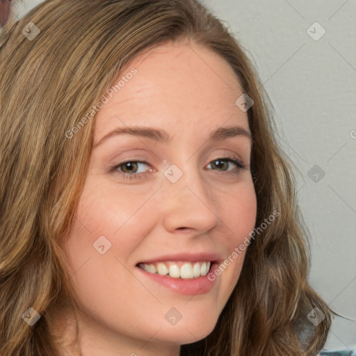 Joyful white young-adult female with long  brown hair and green eyes