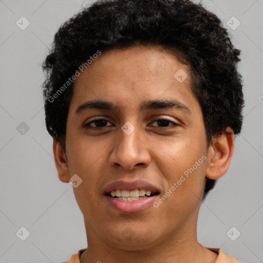 Joyful latino young-adult male with short  brown hair and brown eyes