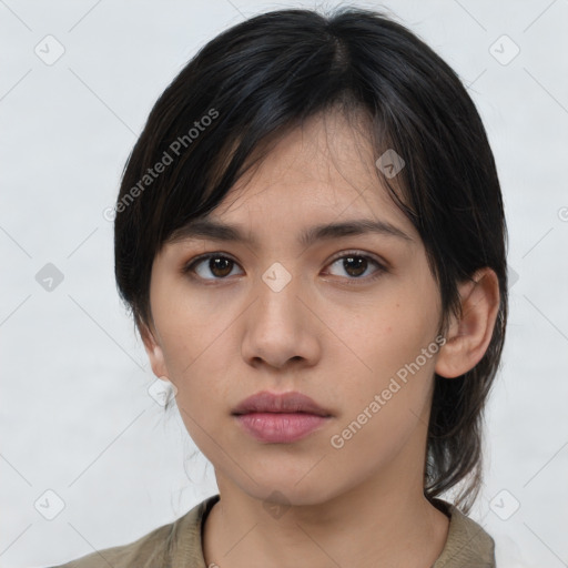 Neutral asian young-adult female with medium  brown hair and brown eyes