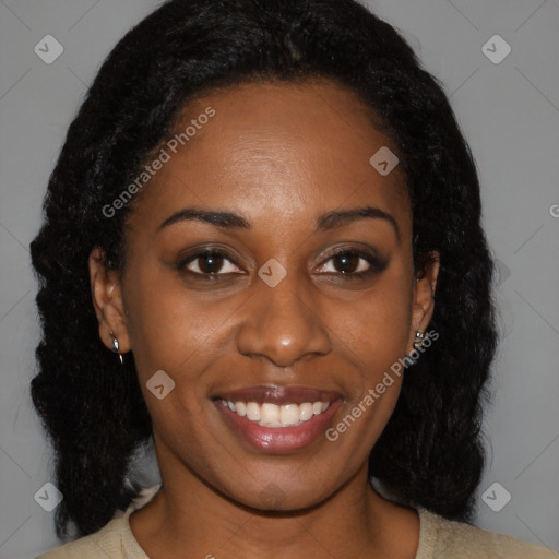 Joyful black young-adult female with medium  brown hair and brown eyes