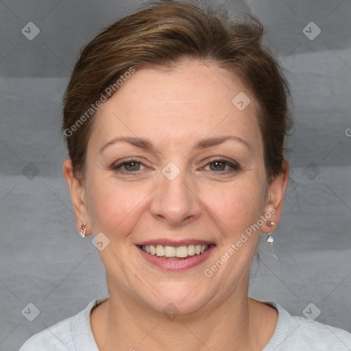 Joyful white adult female with short  brown hair and brown eyes