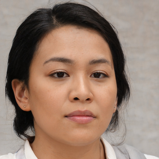 Neutral asian young-adult female with medium  brown hair and brown eyes