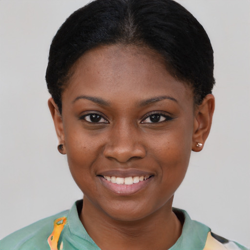 Joyful latino young-adult female with short  brown hair and brown eyes
